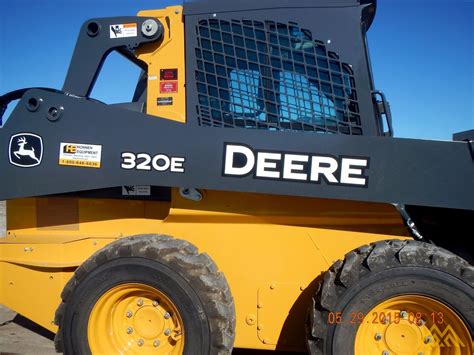 john deere 320e skid steer height|john deere 320 value.